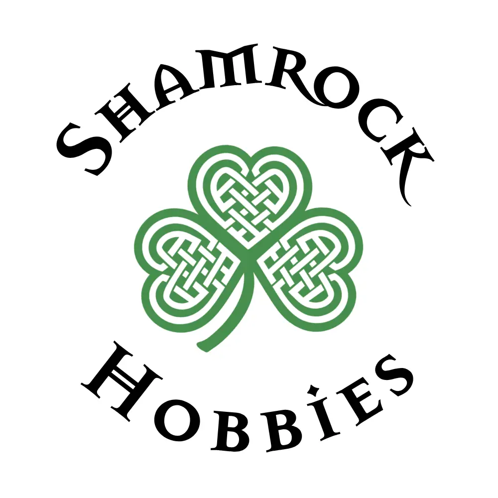Shamrock Hobbies name in black text arched above and below a Celtic pattern shamrock in green.
